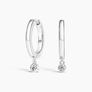Diamond Drop Huggie Earrings in Silver